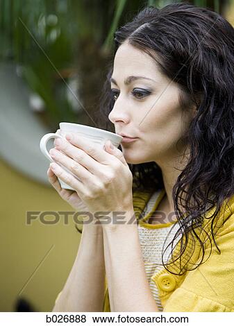 woman holding a mug View Large Photo Image Stock Photo - woman holding a mug. Fotosearch