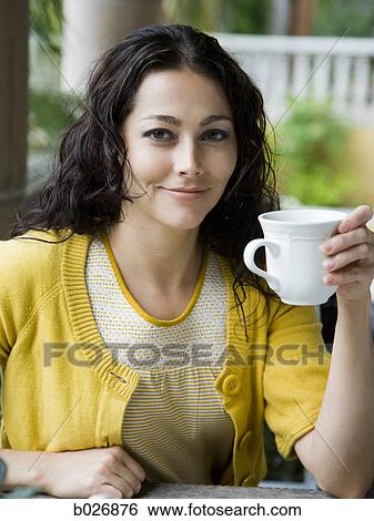 woman holding a mug View Large Photo Image Stock Photograph - woman holding a mug. Fotosearch