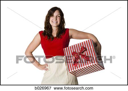 woman holding a present View Large Photo Image Stock Photo - woman holding a present. Fotosearch
