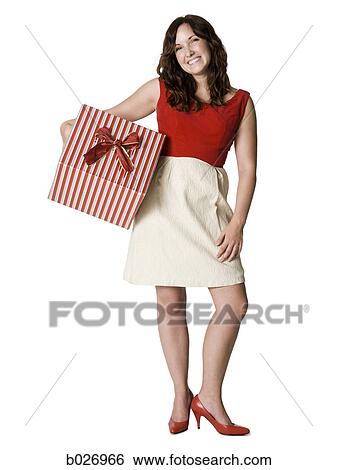 woman holding a present View Large Photo Image Stock Photograph - woman holding a present. Fotosearch