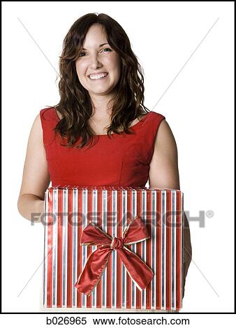 woman holding a present View Large Photo Image Stock Photography - woman holding a present. Fotosearch