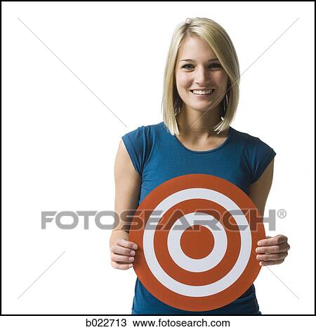 woman holding a target View Large Photo Image Stock Image - woman holding a target. Fotosearch