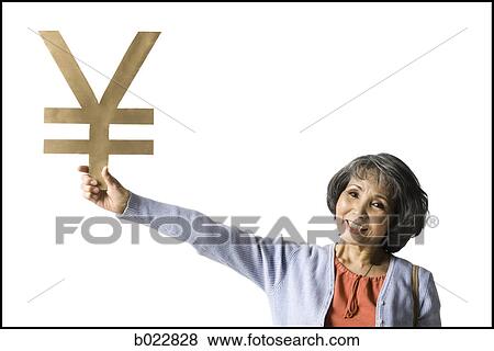 woman holding currency symbol View Large Photo Image Stock Photo - woman holding currency symbol. Fotosearch