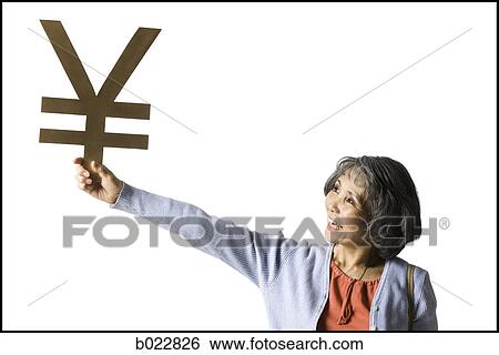 woman holding currency symbol View Large Photo Image Stock Photograph - woman holding currency symbol. Fotosearch