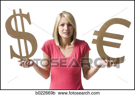woman holding currency symbols View Large Photo Image Stock Image - woman holding currency symbols. Fotosearch