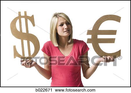 woman holding currency symbols View Large Photo Image Stock Image - woman holding currency symbols. Fotosearch