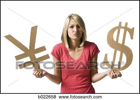 woman holding currency symbols View Large Photo Image Stock Photo - woman holding currency symbols. Fotosearch