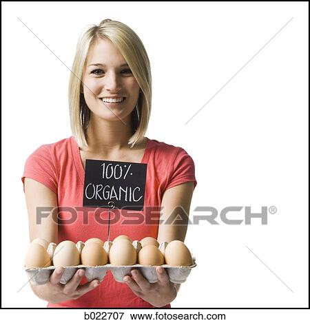 woman holding organic eggs View Large Photo Image Stock Photo - woman holding organic eggs. Fotosearch
