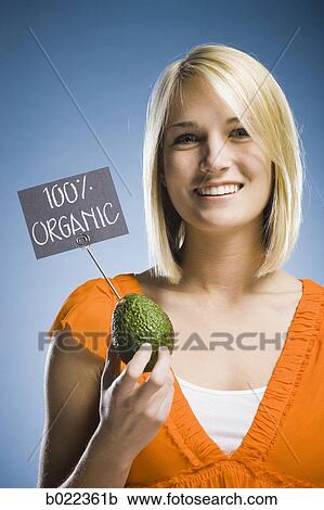 woman holding organic produce View Large Photo Image Stock Image - woman holding organic produce. Fotosearch