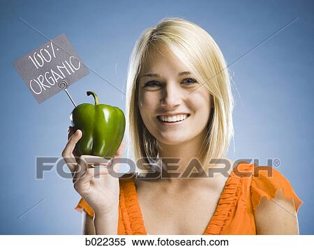 woman holding organic produce View Large Photo Image Stock Photography - woman holding organic produce. Fotosearch