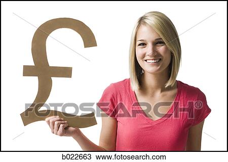 woman holding up british pound symbol View Large Photo Image Stock Image - woman holding up british pound symbol. Fotosearch