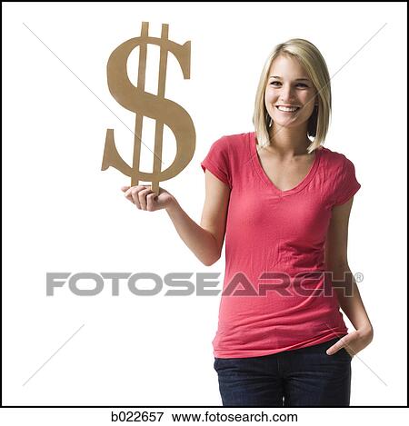 woman holding up dollar symbol View Large Photo Image Stock Photo - woman holding up dollar symbol. Fotosearch