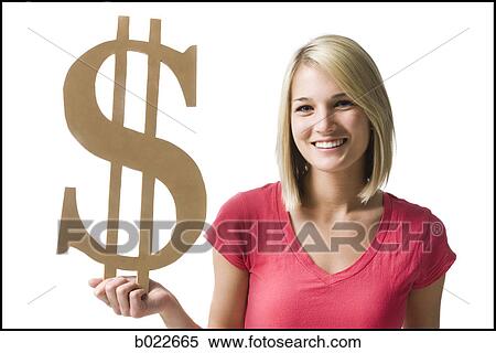 Stock Photography - woman holding up dollar symbol. Fotosearch