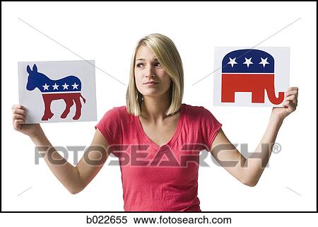 woman holding up political party signs View Large Photo Image Stock Photography - woman holding up political party signs. Fotosearch