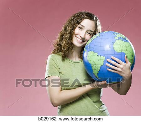 woman hugging a globe View Large Photo Image Stock Image - woman hugging a globe. Fotosearch