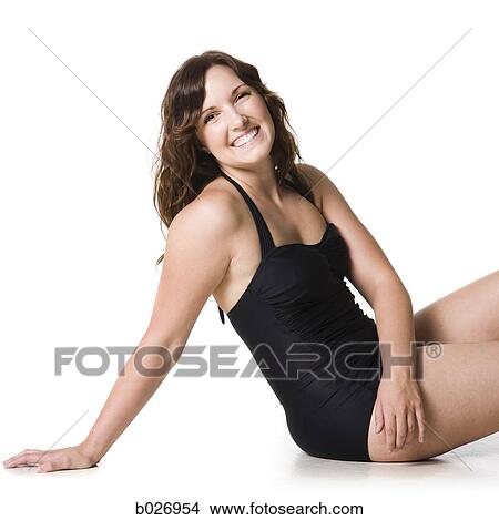 Picture - woman in a black swimsuit. Fotosearch