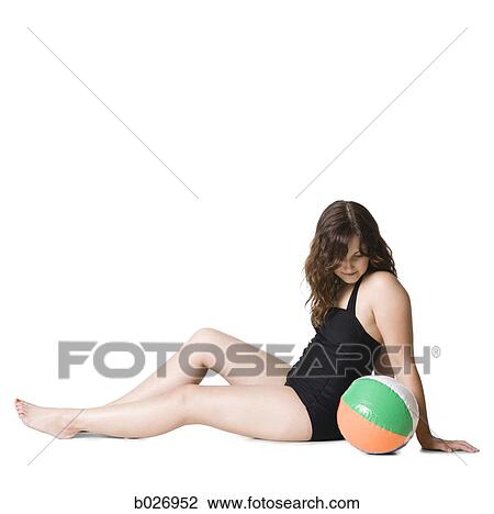 woman in a black swimsuit View Large Photo Image Stock Image - woman in a black swimsuit. Fotosearch