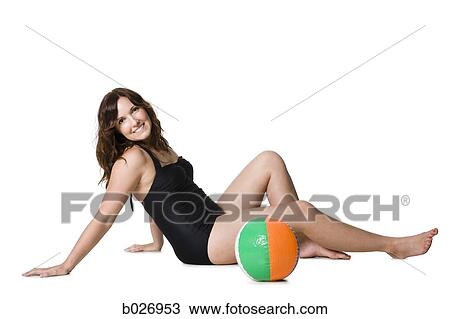 woman in a black swimsuit View Large Photo Image Stock Image - woman in a black swimsuit. Fotosearch