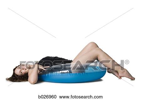 woman in a black swimsuit View Large Photo Image Stock Image - woman in a black swimsuit. Fotosearch