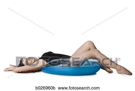 woman in a black swimsuit View Large Photo Image Stock Image - woman in a black swimsuit. Fotosearch