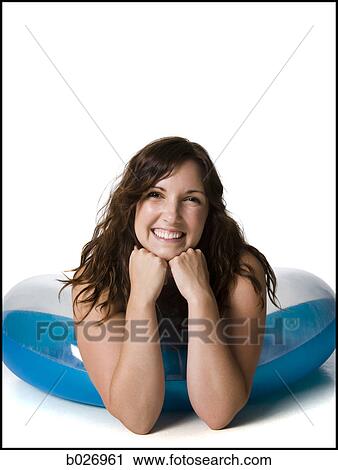 woman in a black swimsuit View Large Photo Image Stock Image - woman in a black swimsuit. Fotosearch