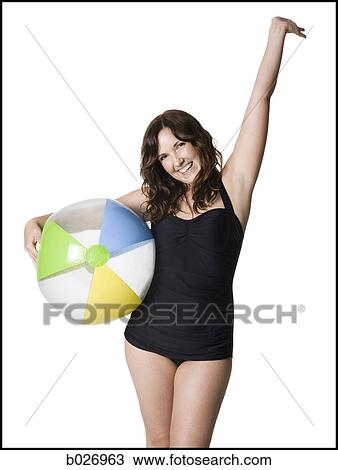 woman in a black swimsuit View Large Photo Image Stock Image - woman in a black swimsuit. Fotosearch
