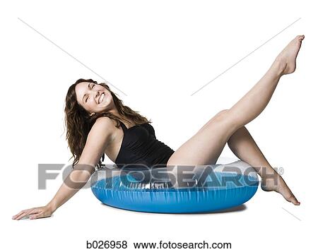 woman in a black swimsuit View Large Photo Image Stock Photo - woman in a black swimsuit. Fotosearch