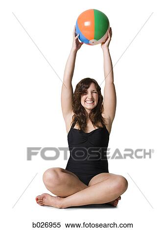 woman in a black swimsuit View Large Photo Image Stock Photography - woman in a black swimsuit. Fotosearch