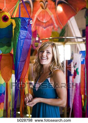 woman in a kite store View Large Photo Image Stock Photo - woman in a kite store. Fotosearch