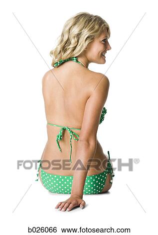 Stock Photograph - woman in a polka dot bikini. Fotosearch
