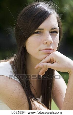 woman in a white shirt View Large Photo Image Picture - woman in a white shirt. Fotosearch