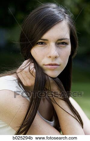 woman in a white shirt View Large Photo Image Stock Image - woman in a white shirt. Fotosearch
