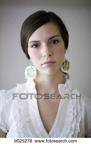 Stock Photo - woman in a white shirt. Fotosearch