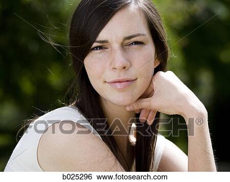 woman in a white shirt View Large Photo Image Stock Photograph - woman in a white shirt. Fotosearch