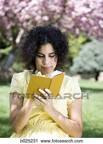 woman in a yellow dress with her diary View Large Photo Image Stock Image - woman in a yellow dress with her diary. Fotosearch