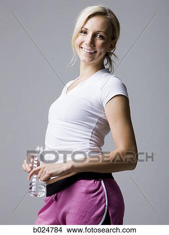 woman in pink running shorts View Large Photo Image Picture - woman in pink running shorts. Fotosearch