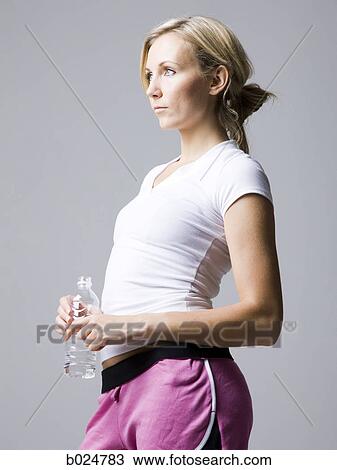 woman in pink running shorts View Large Photo Image Stock Image - woman in pink running shorts. Fotosearch