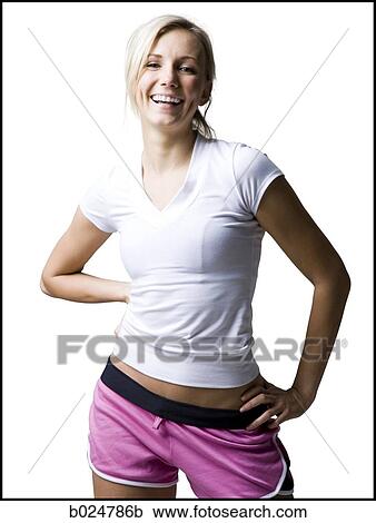Stock Image - woman in pink running shorts. Fotosearch
