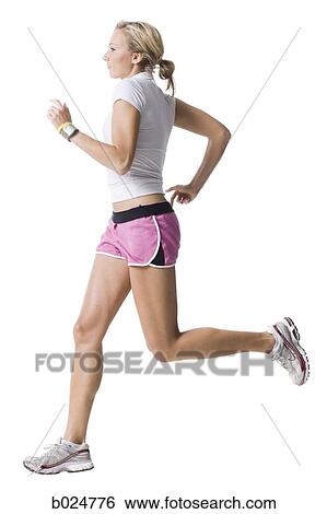 Stock Photograph - woman in pink running shorts. Fotosearch