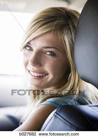 woman in the car View Large Photo Image Stock Image - woman in the car. Fotosearch