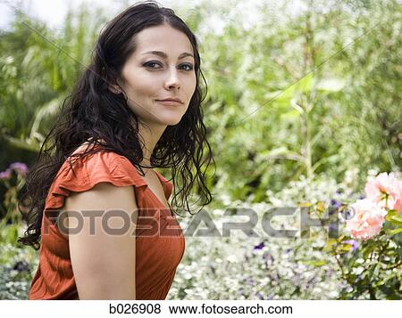Stock Photo - woman in the garden. Fotosearch