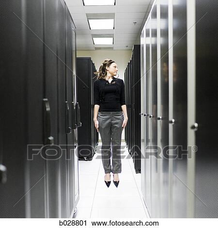 woman jumping in a server room View Large Photo Image Stock Image - woman jumping in a server room. Fotosearch