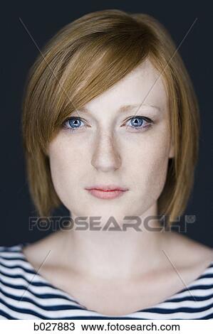 Stock Image - woman looking at camera. Fotosearch