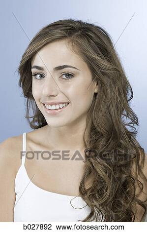 Stock Image - woman looking at camera. Fotosearch