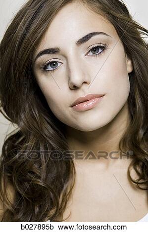 Stock Image - woman looking at camera. Fotosearch