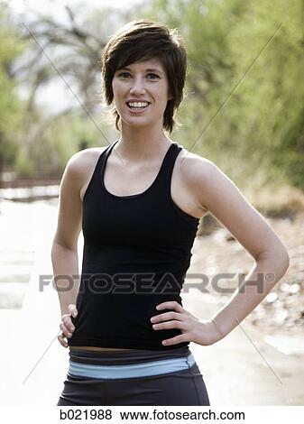 Stock Photo - woman looking at camera. Fotosearch