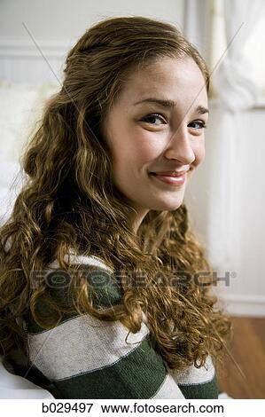 Stock Photo - woman looking at camera. Fotosearch
