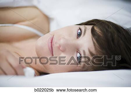 woman lying on her side View Large Photo Image Stock Image - woman lying on her side. Fotosearch