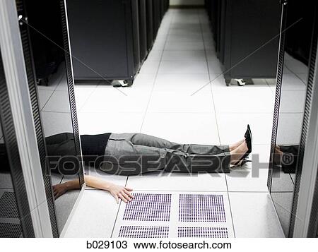 woman lying on the floor in a server room View Large Photo Image Stock Image - woman lying on the floor in a server room. Fotosearch