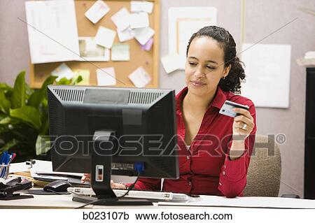 woman making an online purchase View Large Photo Image Stock Image - woman making an online purchase. Fotosearch